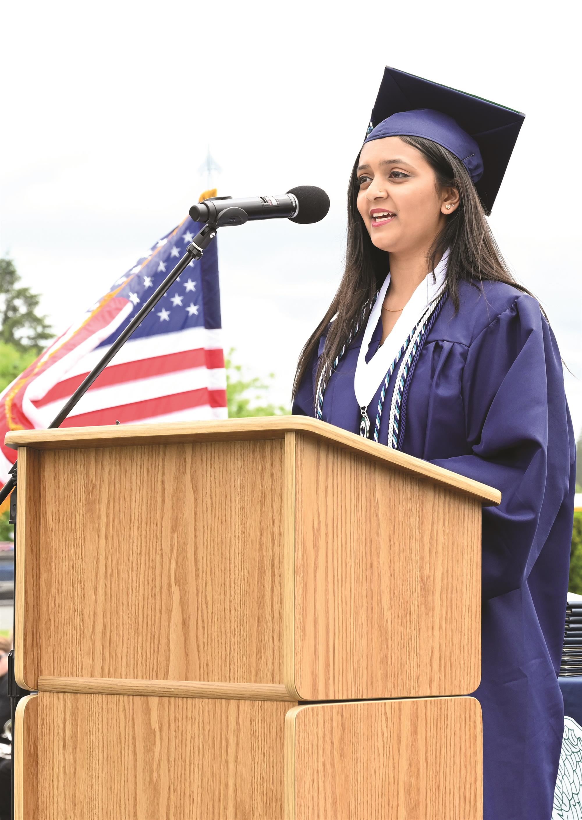 2022 graduate giving a speech.